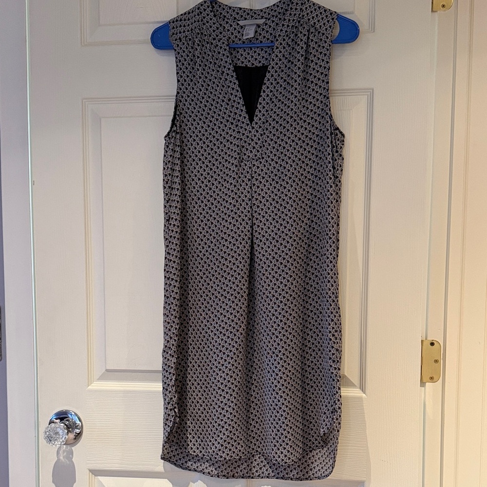 Black and white pattern sleeveless slip dress.